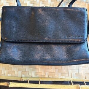 Fossil Black Leather Crossbody. Kiss lock snap. Zip Organizer​